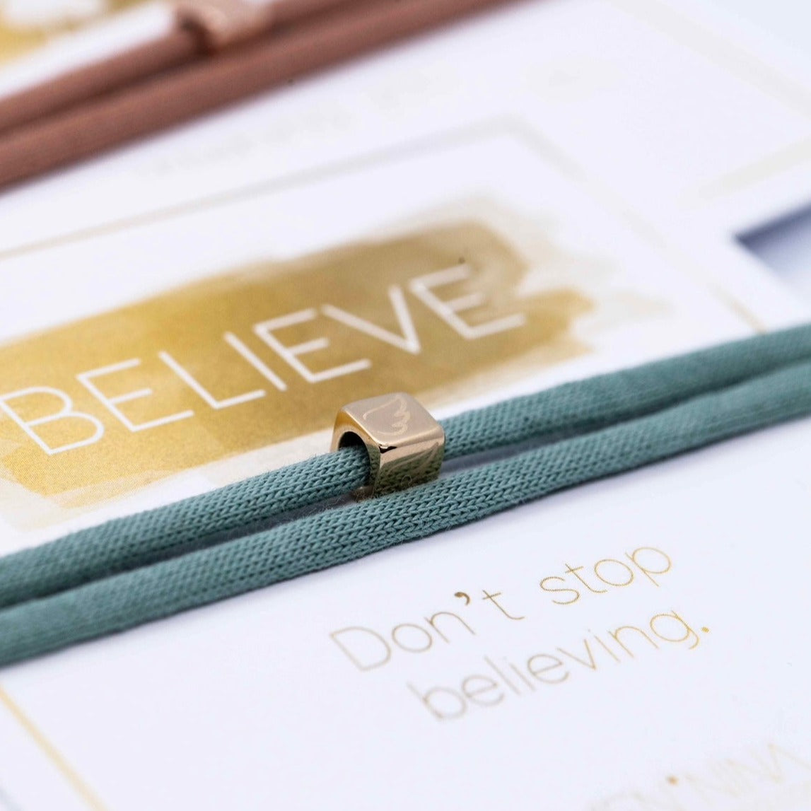 N*ITIAL ENGEL "BELIEVE''